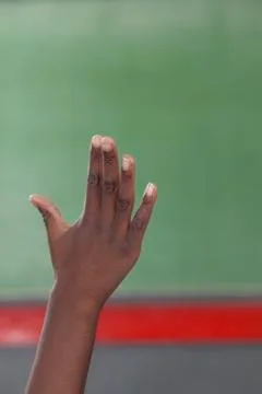 The pupil hand up Фото