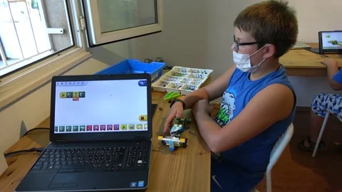 Pupil learns programming at the Robotics lesson Stock Footage 164045931