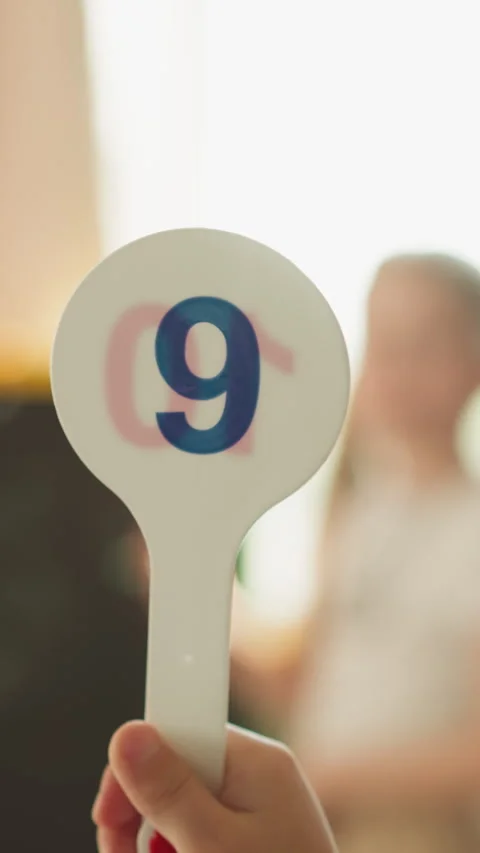 Pupil shows digit solving maths problems with sister at home Stock Footage 273916423