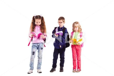 Pupils with backpacks Stock Photos
