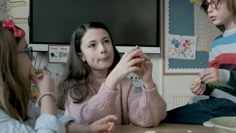 Pupils in a classroom during break time ... | Stock Video | Pond5