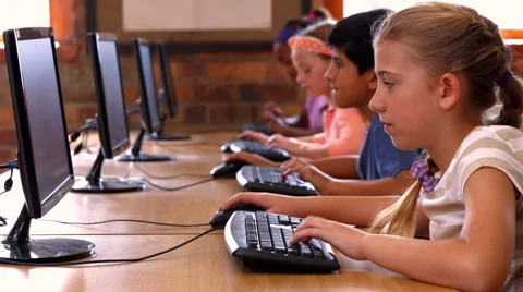 Pupils in computer class at school Stock Footage 47500441