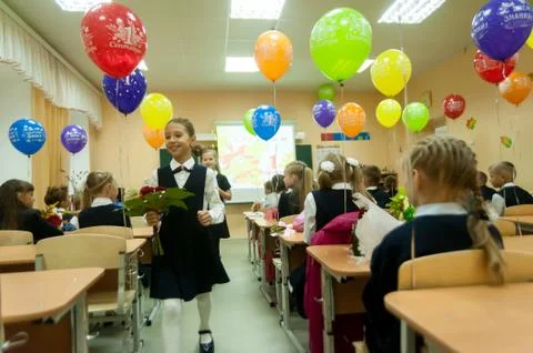 Pupils of elementary school in classroom Stock Photos