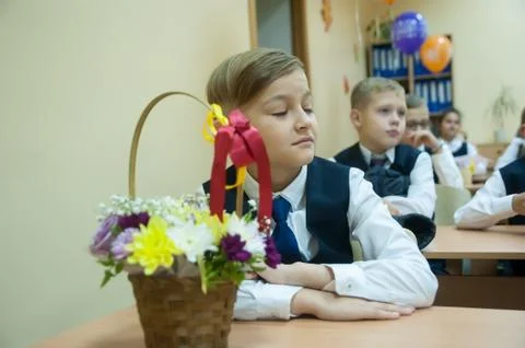 Pupils of elementary school in classroom Stock Photos