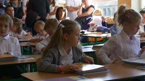 Pupils Have Received a Multi-Coloured Brochures With a Pictures From Their Stock Footage 67019602