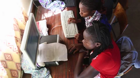 Pupils learning with computers in Kenya, Africa Stock Footage 169659023