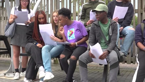 Pupils react to GCSE results Video stock 248688219