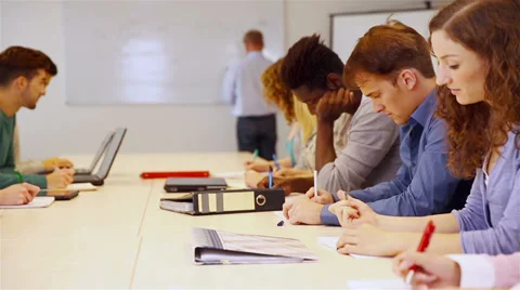 Pupils in school learning Stock Footage 33289858