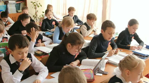 Pupils at the school sitting in class Stock Footage 62637049