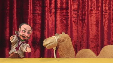 Puppet Circus Presenter with Camel Video stock 72896577