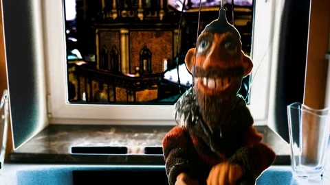 The puppet is dancing on the window sill. Animated version. Stock Footage 102704833