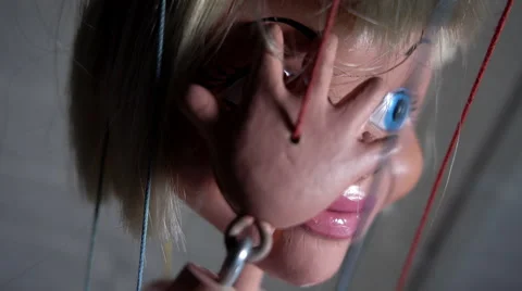 Puppet with hands to her face Stock Footage 55779217