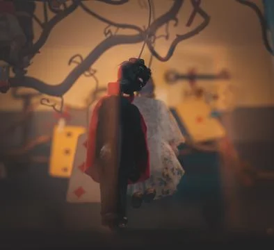 Puppet hanged from a tree Stock Photos