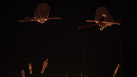 Puppet master and marionettes. Manipulations with the mind and actions of people Stock Footage 146679490
