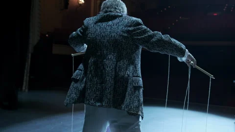 Puppet master hold under controll Stock Footage 245229285