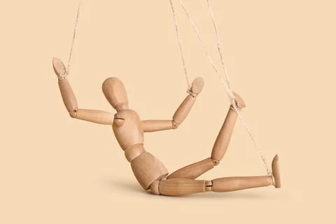 Puppet with strings on beige background Stock Photos