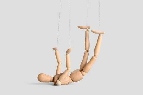 Puppet with strings on light background Stock Photos