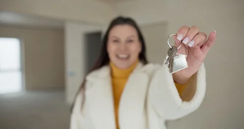 Purchase of an apartment, house from a developer. Smiling cheerful woman looks Video stock 260687127