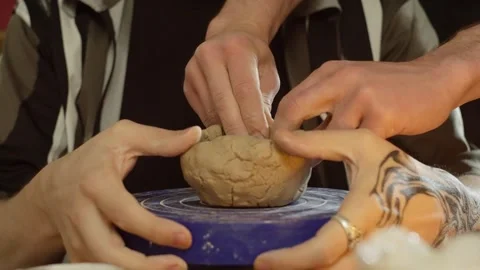Purchase plan for making a blank of the correct shape from clay by men's hands. Stock Footage 252584476