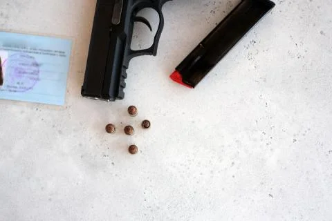 Purchased weapons and ammunition, documents. Purchase of 9mm barrel with full Stock Photos