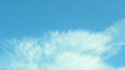 Pure azure sky white clouds time lapse on sunny day. Clear blue skyscraper white Stock Footage 303964943
