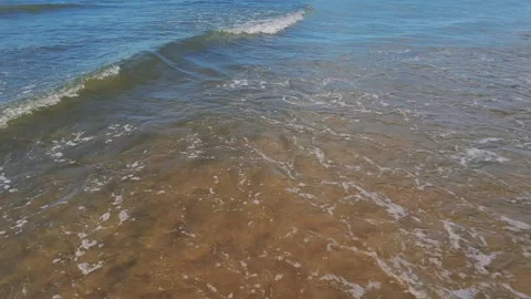 Pure blue Ocean water waves with light reflections at Slow motion Stock Footage 337349748