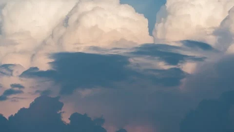 Pure Blue Sky and Fluffy White Clouds Moving Fast in Sunlight Time-lapse Stock Footage 326703175