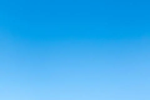 Pure blue sky without clouds. Natural background. Stock Photos