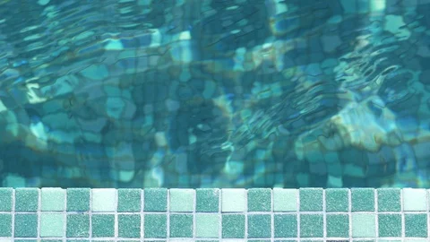 Pure blue water in pool with bright reflections Stock Footage 130136029