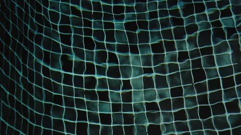 Pure blue water in the pool with light reflections. Slow motion,at Phuket Tha Video stock 110739262