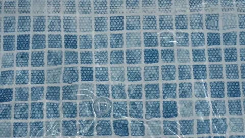 Pure blue water in the pool with light reflections Video stock 154163380