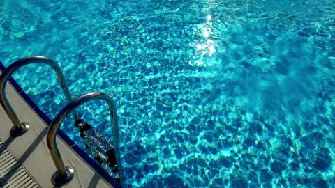 Pure blue water in the pool with light reflections Video stock 194907609