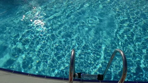 Pure blue water in the pool with light reflections Stock Footage 194907706