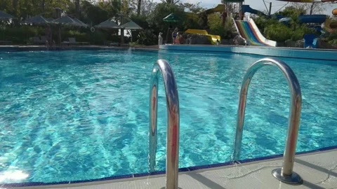 Pure blue water in the pool with light reflections Video stock 194907794
