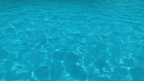 Pure blue water in the pool with light reflections. abstract background Stock Footage 208120199