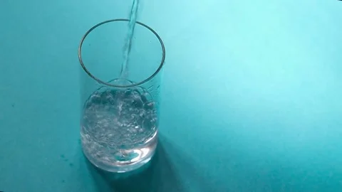 Pure drinking water being poured in a glass. Video stock 200708780