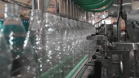 Pure drinking water plant. Work conveyor in the enterprise Stock Footage 130878210
