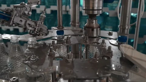 Pure drinking water plant. Work conveyor in the enterprise Stock Footage 130878644