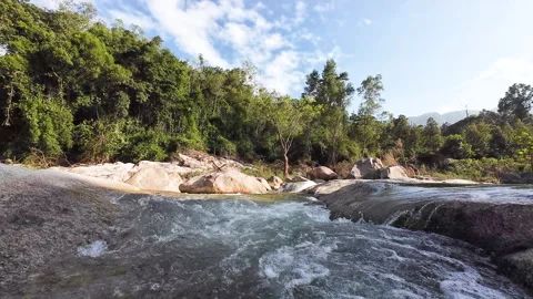 Pure Ecological Stream flows clean. Crystal water defines Pure Ecological Stream Stock Footage 326597494