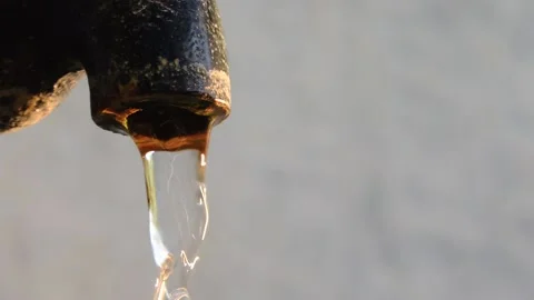 Pure fresh clean drinking water flowing falling dropping from running tap faucet Stock Footage 141256982