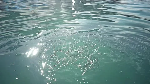 Pure fresh Water being splashed on River or Lake. Close up of Crystal Drops Stock Footage 247837741