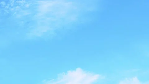 Pure light blue sky and white clouds in sunlight time lapse. Beautiful clear azu Stock Footage 304511470