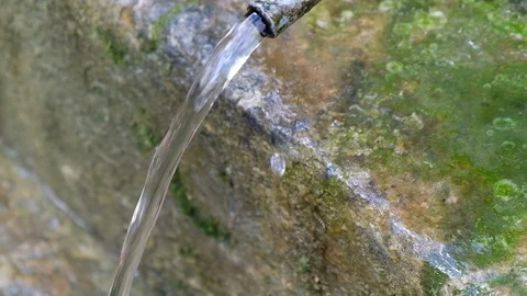 Pure liquid water motion flow from natural source fontain in italy,cilento 4k Video stock 121151355