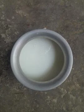 Pure milk in a pot Stock Photos
