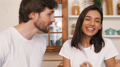 Pure models communicating in the kitchen Stock Footage 150633862