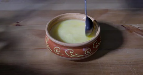 Pure OR Desi Ghee also known as clarified liquid butter Stock Footage 196447236