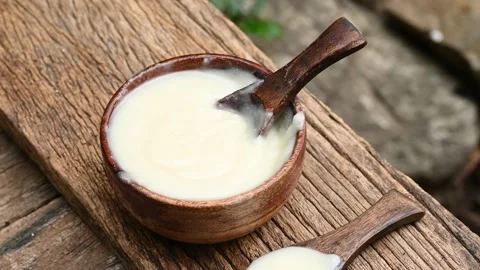 Pure OR desi ghee also known as clarified liquid butter. pure OR desi ghee .. Stock Footage 339002248