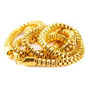 Pure solid gold chain necklace bracelet on white background Stock Photos