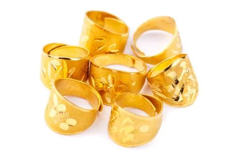 Pure solid gold rings on white background (24k gold ring) Stock Photos