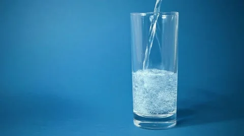 Pure sparkling soda water pouring into the glass Stock Footage